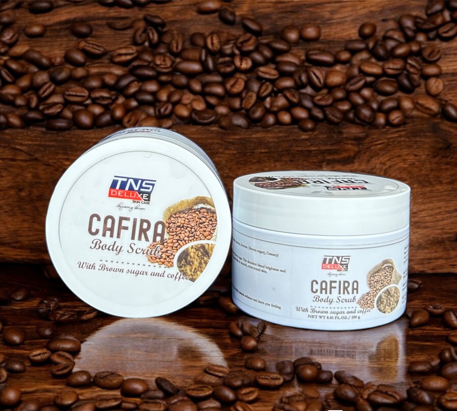 Image of the Cafira body Scrub, in a white container with product branding