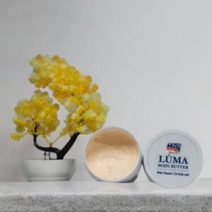 A creative image of teh luma body butter with a flower in the background