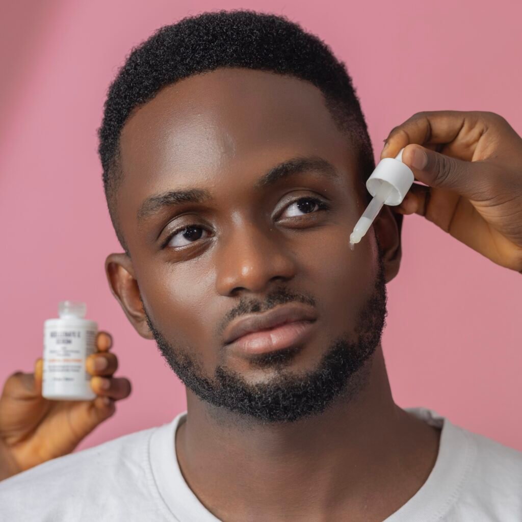 Image of a model having a Tns skin care applied on his face.